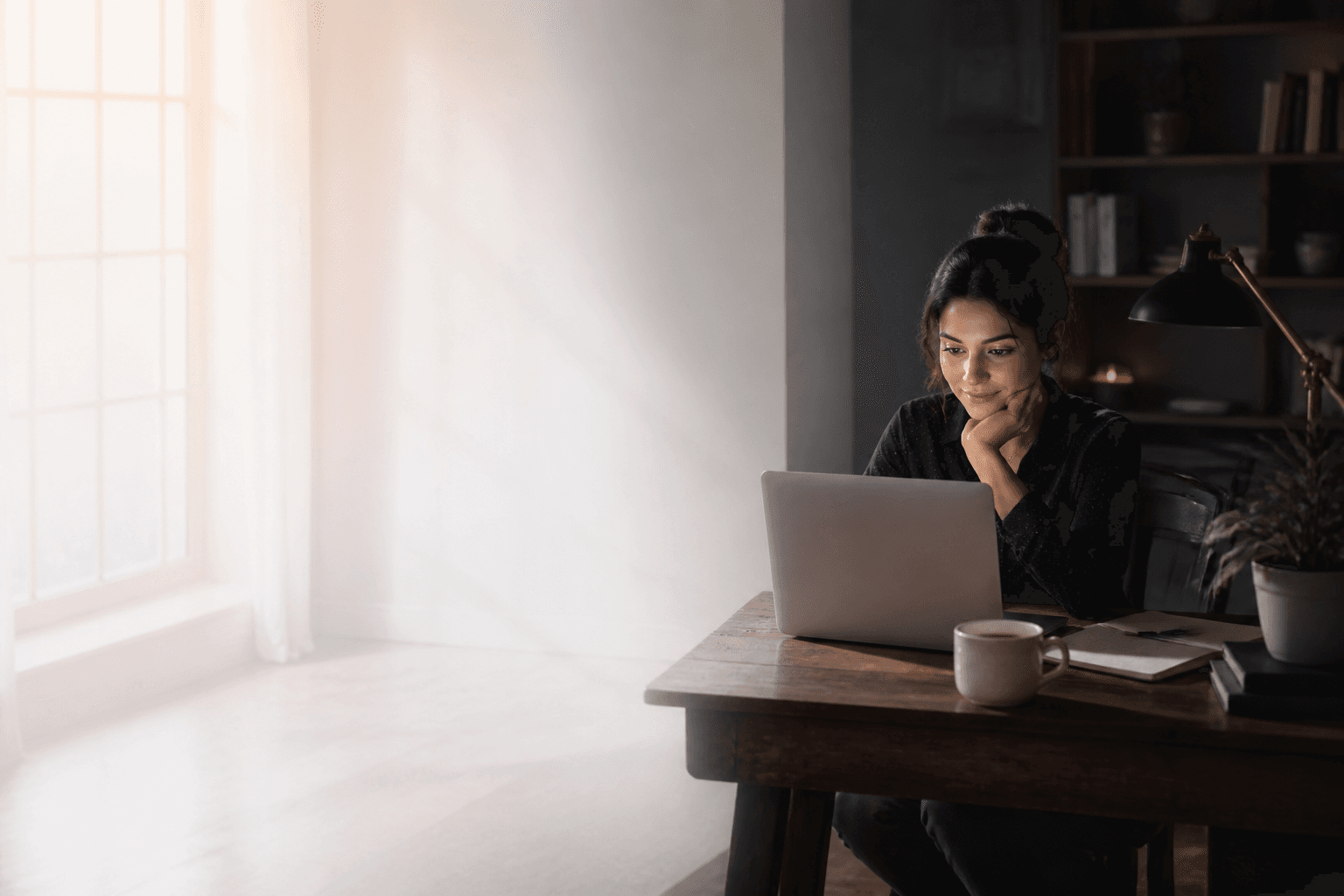 An operator at her desk, ready to take over when a customer needs a person